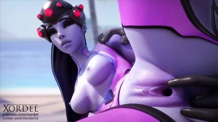 Widowmaker desnuda en la playa