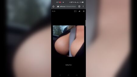 Las tetas entre el cinturón de seguridad del coche